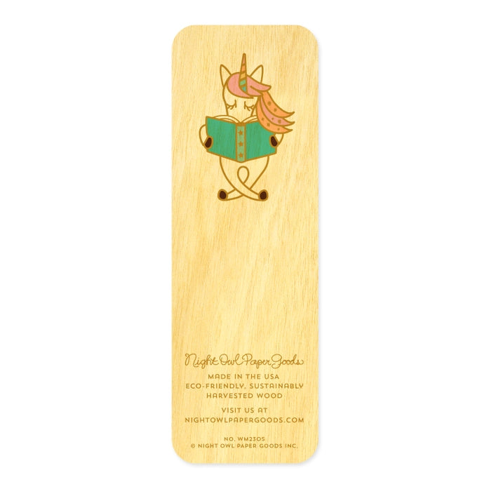 Wooden bookmark with a unicorn reading a book design on a white background
