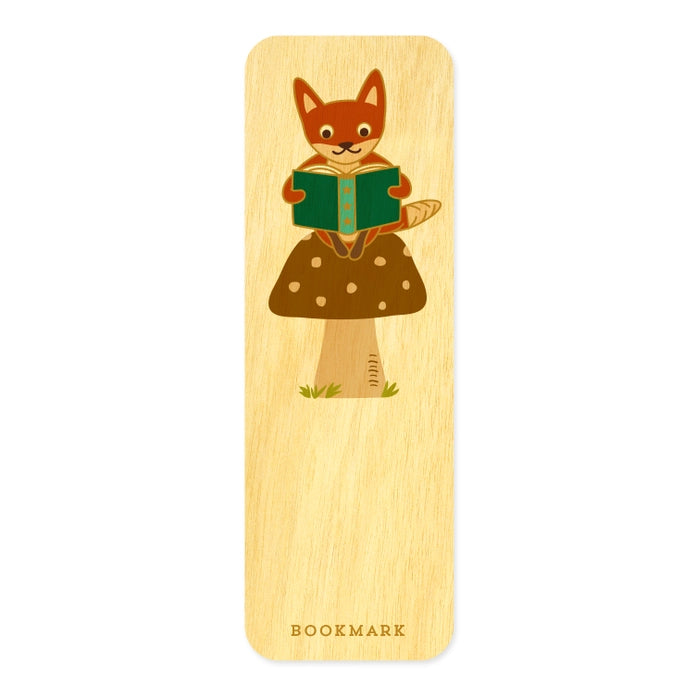 Wooden bookmark with a fox design holding a book on a white background