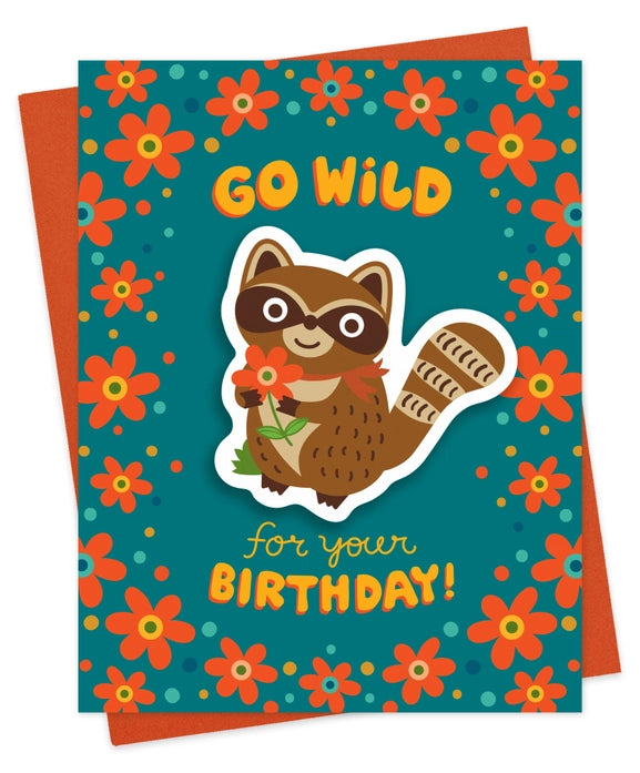 Birthday card with raccoon illustration and floral design
