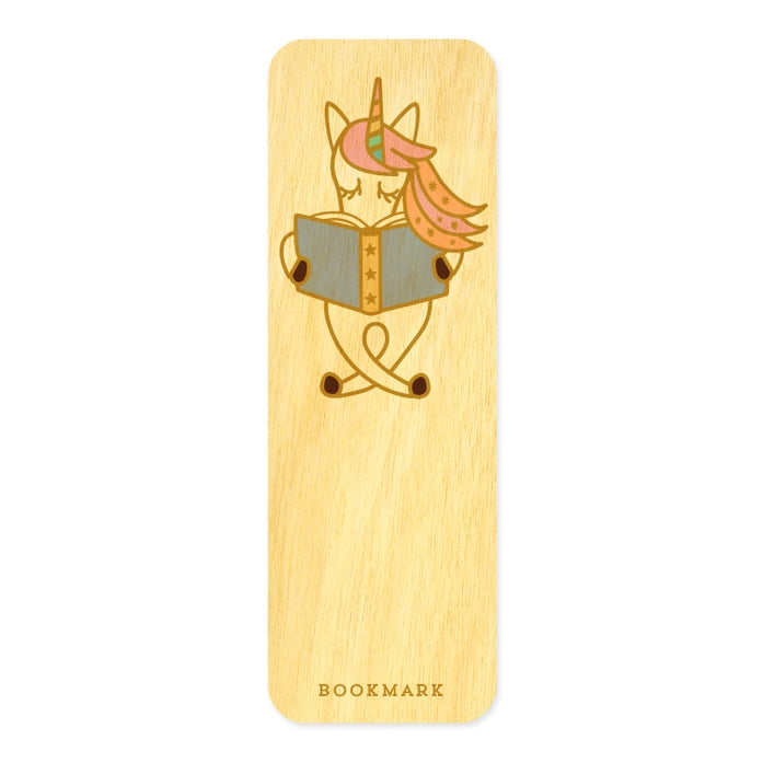 Wooden bookmark with a unicorn reading a book design on a white background