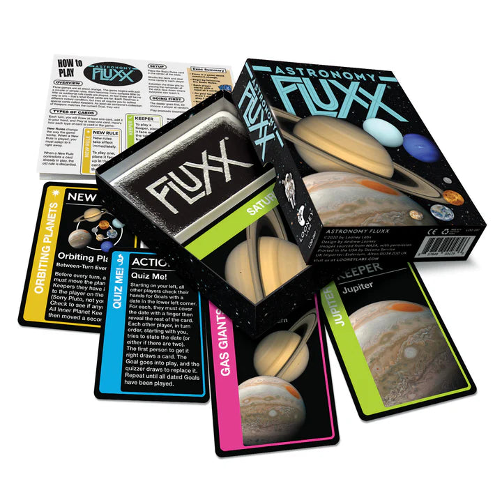 Fluxx card game with astronomy-themed cards and box on a white background