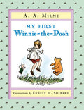 Cover art for My First Winnie-the-Pooh showing Christopher Robin jumping with Winnie the Pooh bear and Piglet