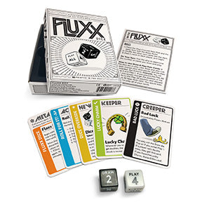 Fluxx card game components including cards and dice on a white background