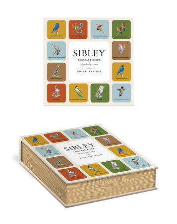 Sibley field guide with colorful illustrations on a white background